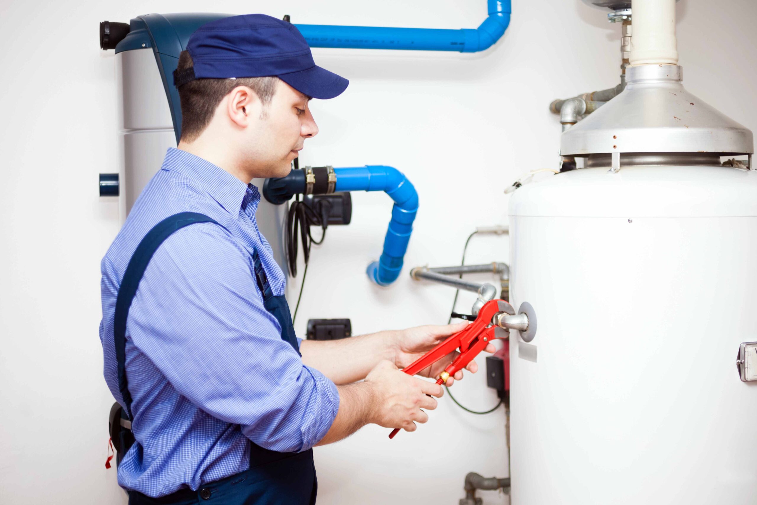 plumber at work scaled